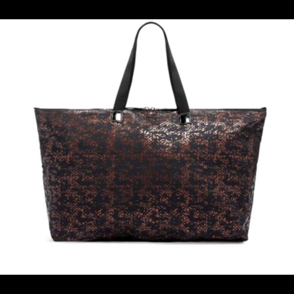 Tumi Voyager Tote-black & rose gold